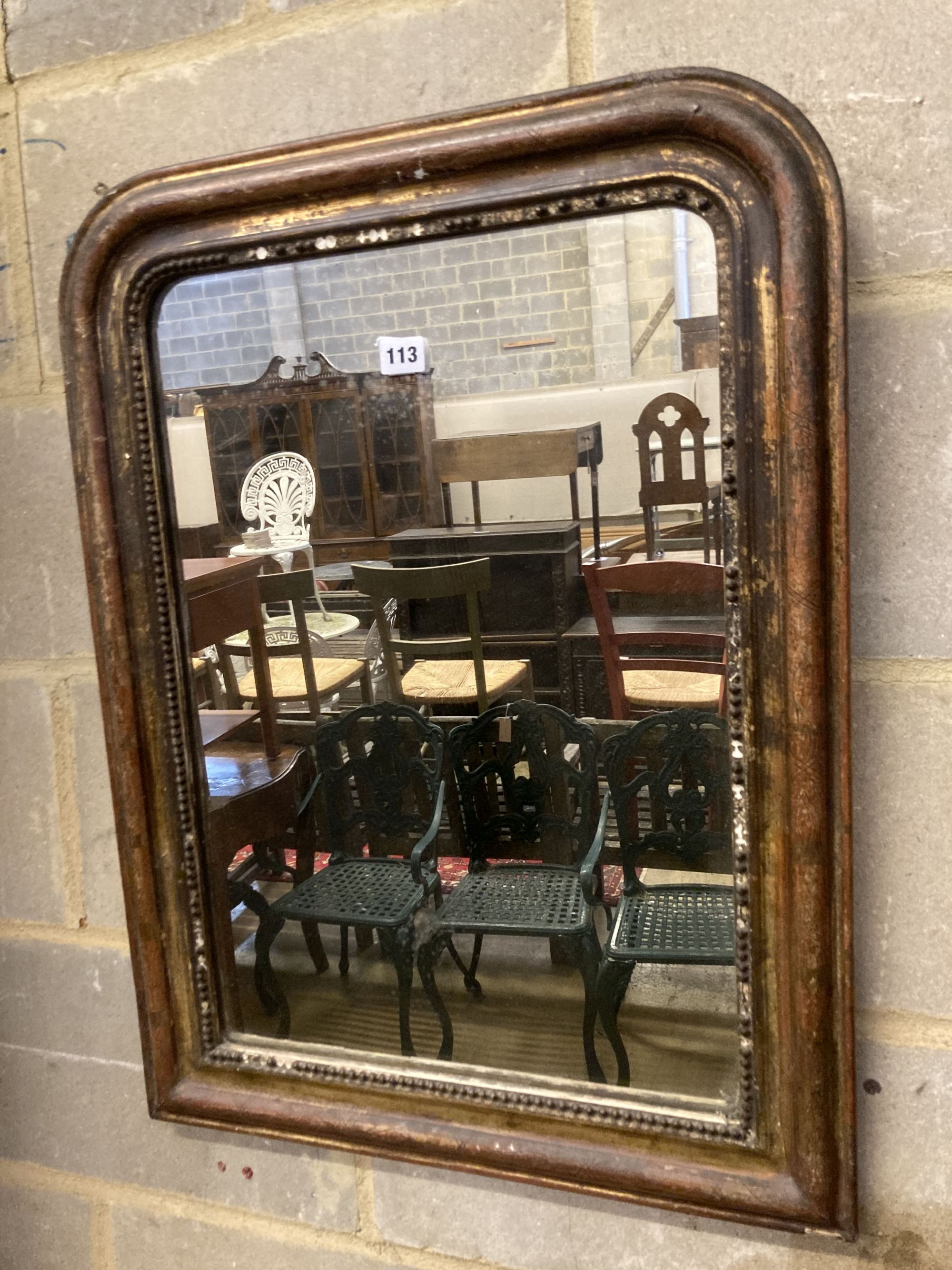 A 19th century French painted parcel gilt wall mirror, width 54cm, height 72cm